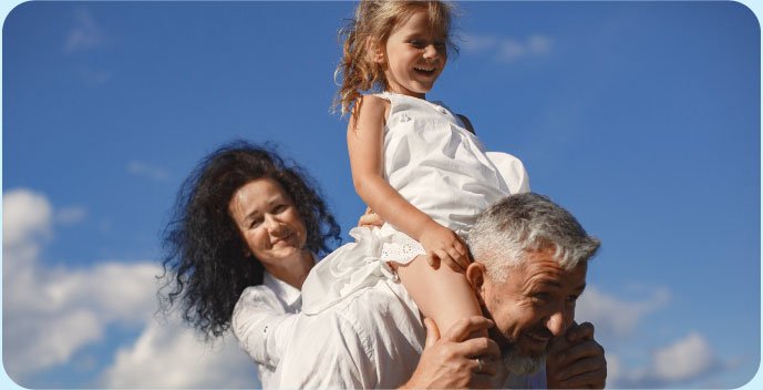 Happy family enjoying life together, representing integrative psychiatric and mental health care for all ages at Healthy Soul Psychiatry in Katy, Texas.